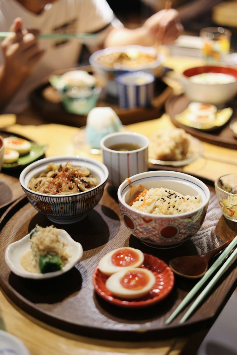 An everyday Japanese table setting with rice bowls and small dishes